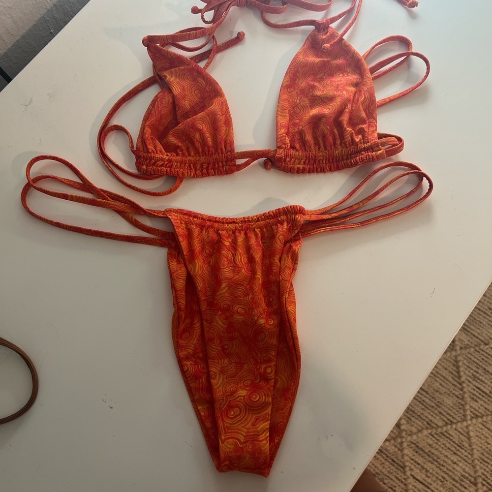 Shop Gonza bikini brand new never worn. Size large bottoms medium top.